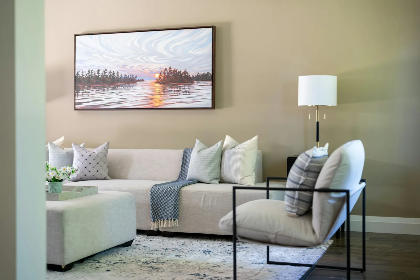Room inspiration: art above a sofa in a softly lit living room